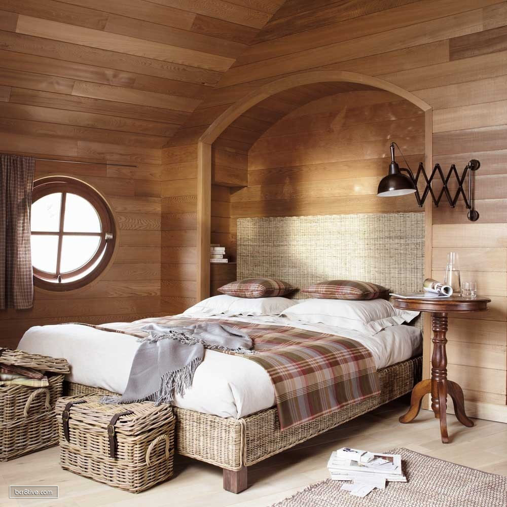 Vaulted Ceiling Bedroom Decorated in Woods & Rattan Furnishing