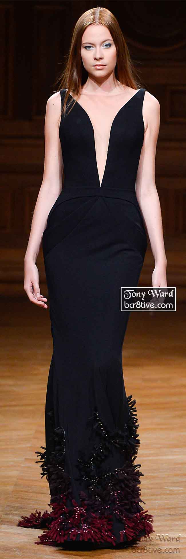 Enigmatic and Snug Black Sculpted Gown with Deep Arched Neckline and Tufted Appliqued Bottom