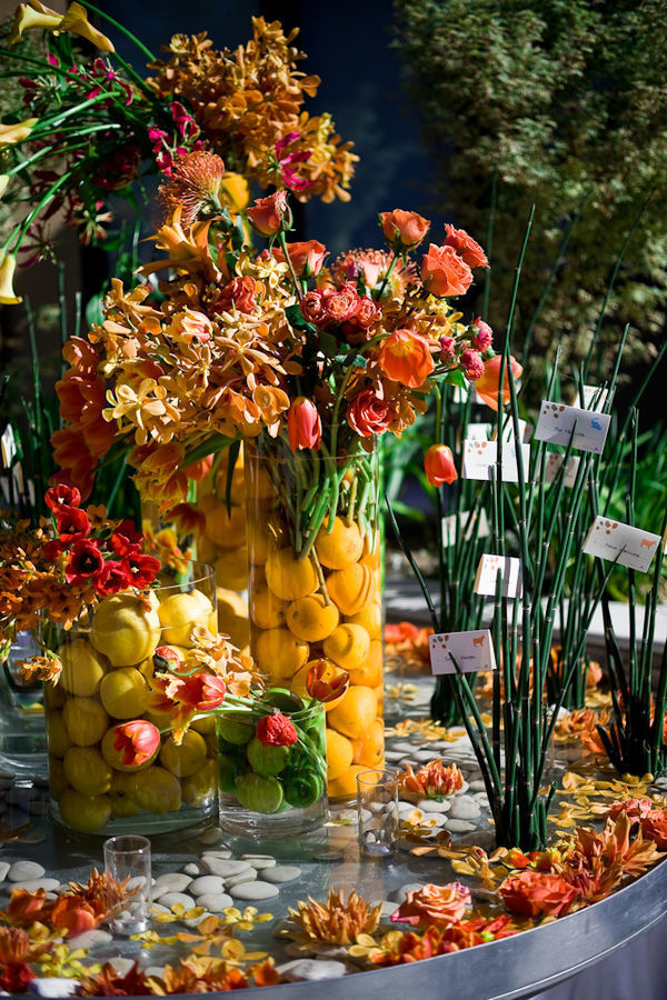 Fruit filled floral vases by Event Planner Waterlily Pond - Photo by Cliff Brunk