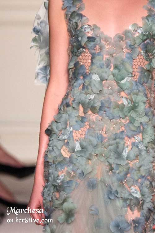 Marchesa - Cage like fabric with feathers